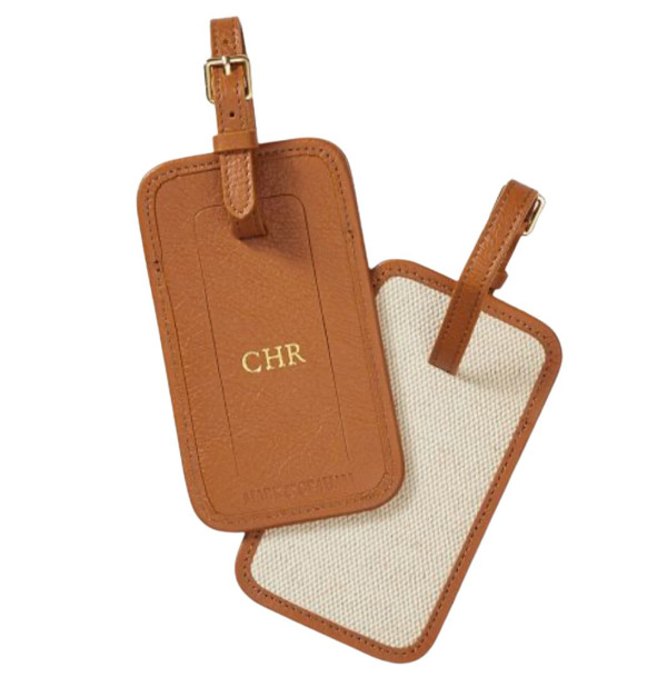 Leather tan-colored luggage tag with initials