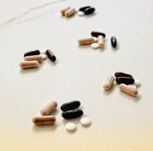 Pills on table grouped by morning dose