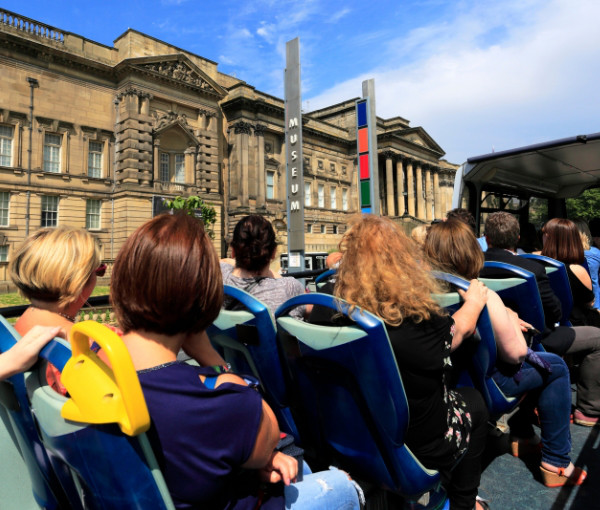 The top deck of a double-decker tourist bus.